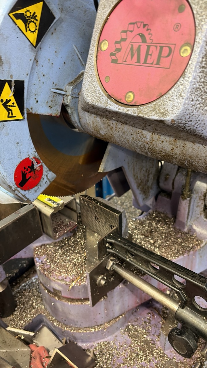 Cold saw cutting stainless box section to length