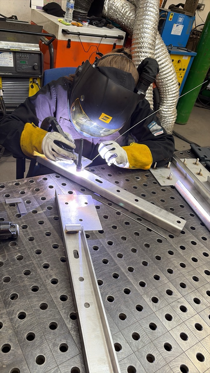TIG welding a stainless steel awning bracket under argon shielding