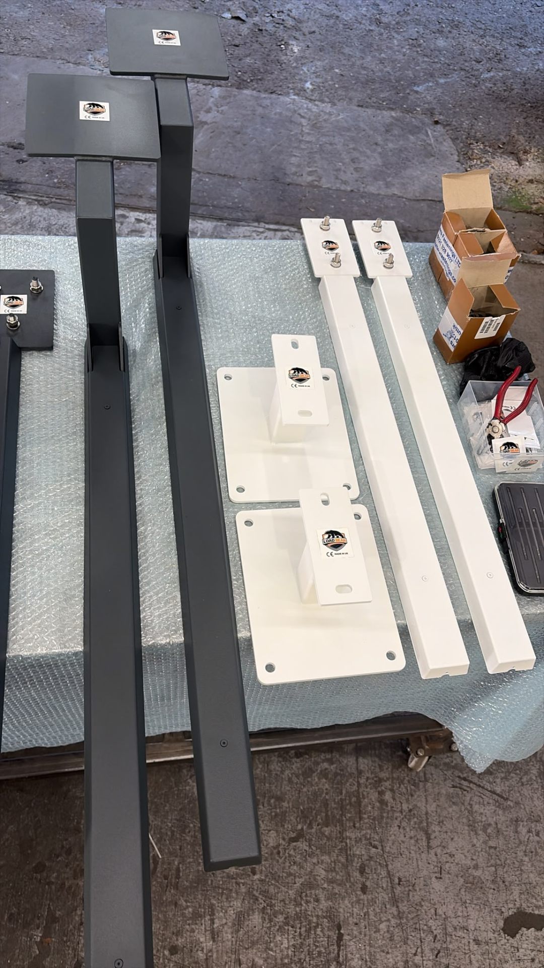 Anthracite uprights with matched white wall plates ready for despatch