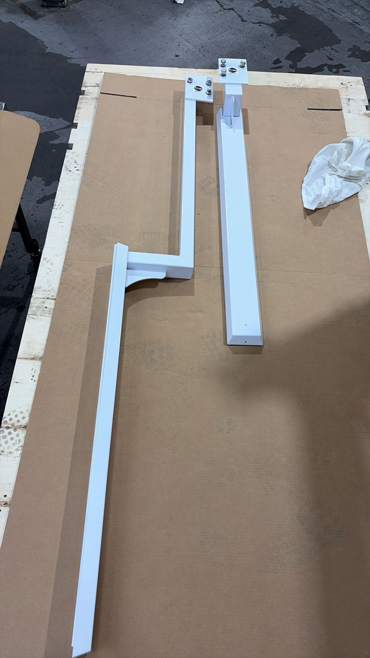 White brackets — final inspection
